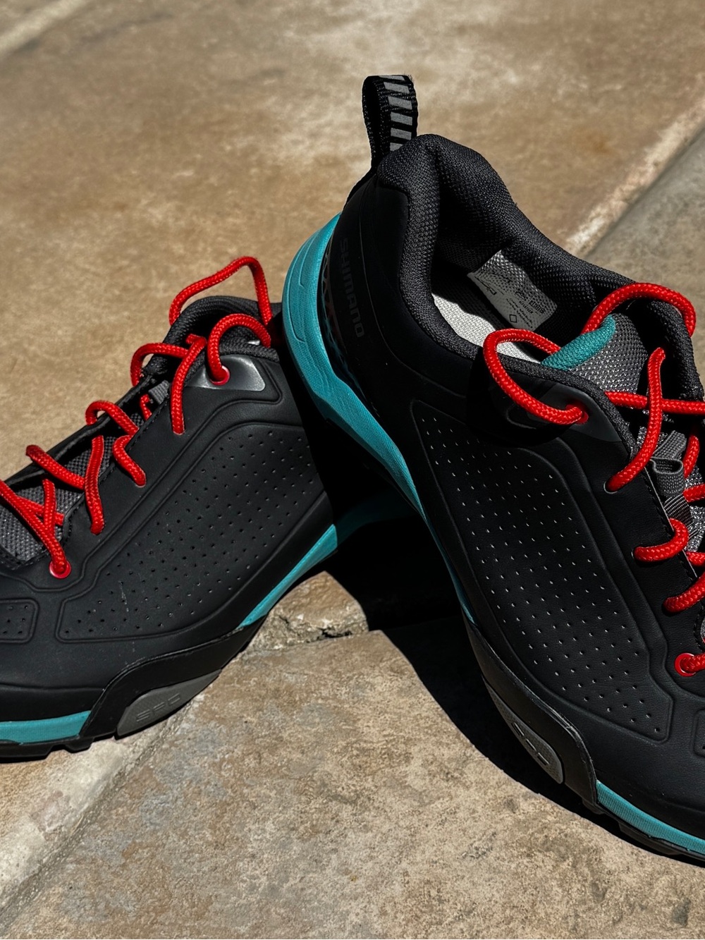 SHIMAMO Grey cycling Shors with Teal Accents and Red Laces